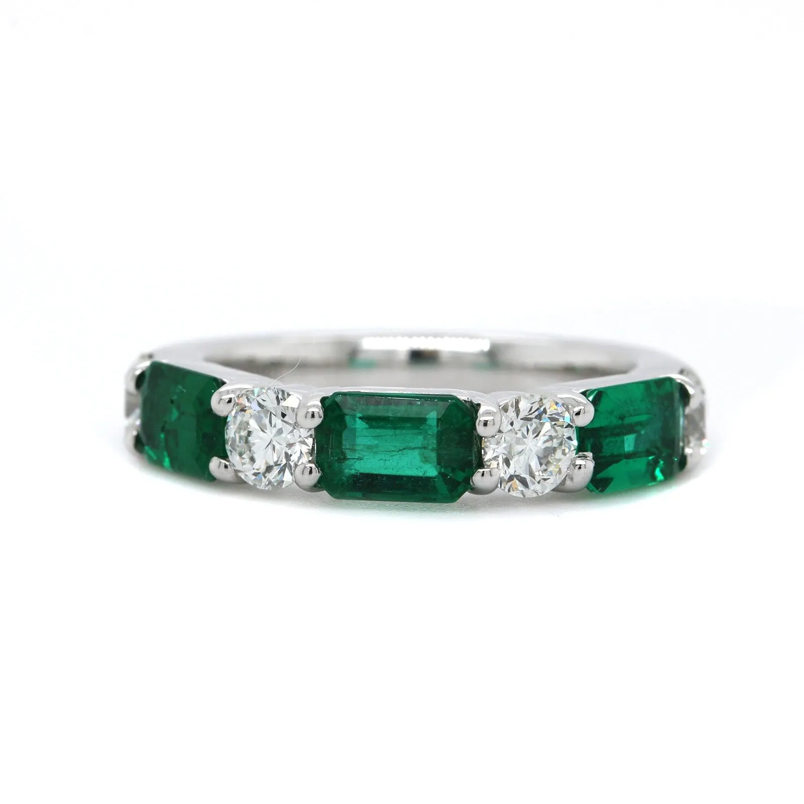 Platinum Shared Prong Emerald and Diamond Band